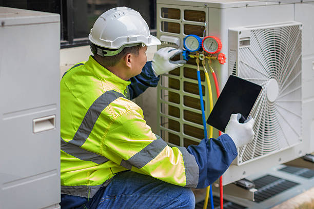 Professional Heat Pump Repair technician working in Acampo, CA
